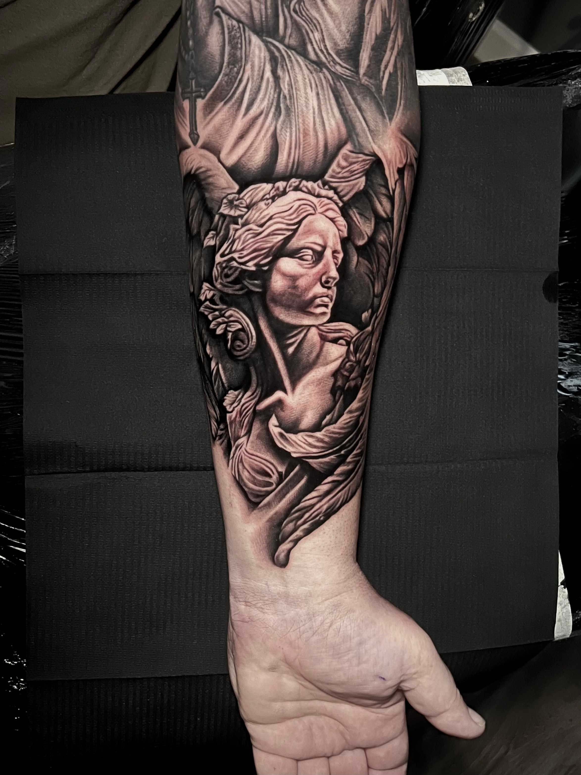 sculpture angel tattoo